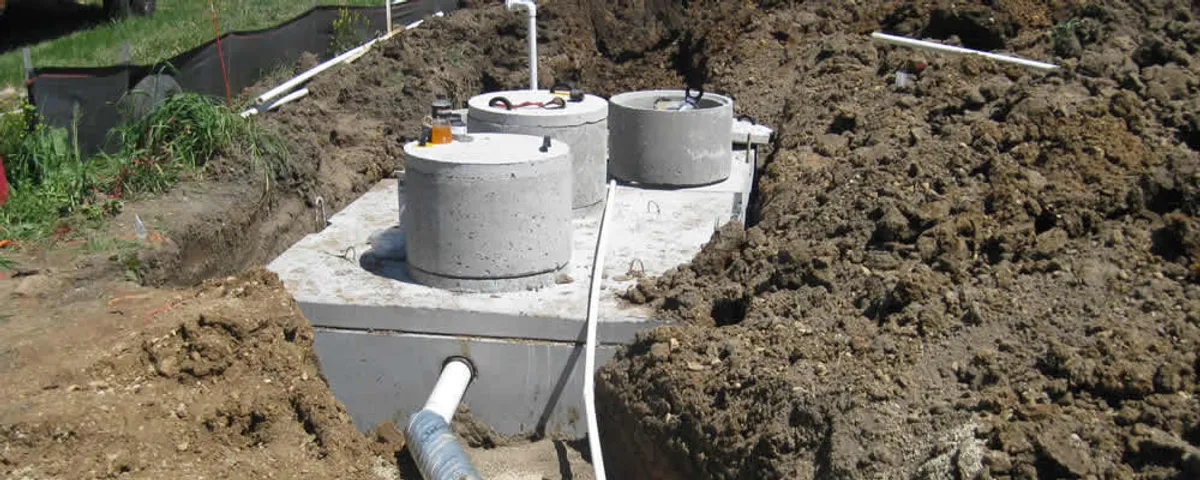 Septic system repair and installation site with tank access ports in Miami, FL